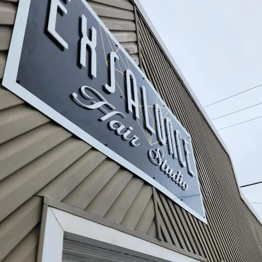 Exsalonce Hair Studio sign