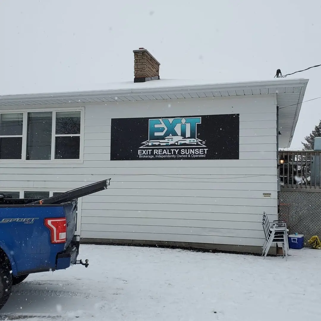 EXIT Sunset Realty sign