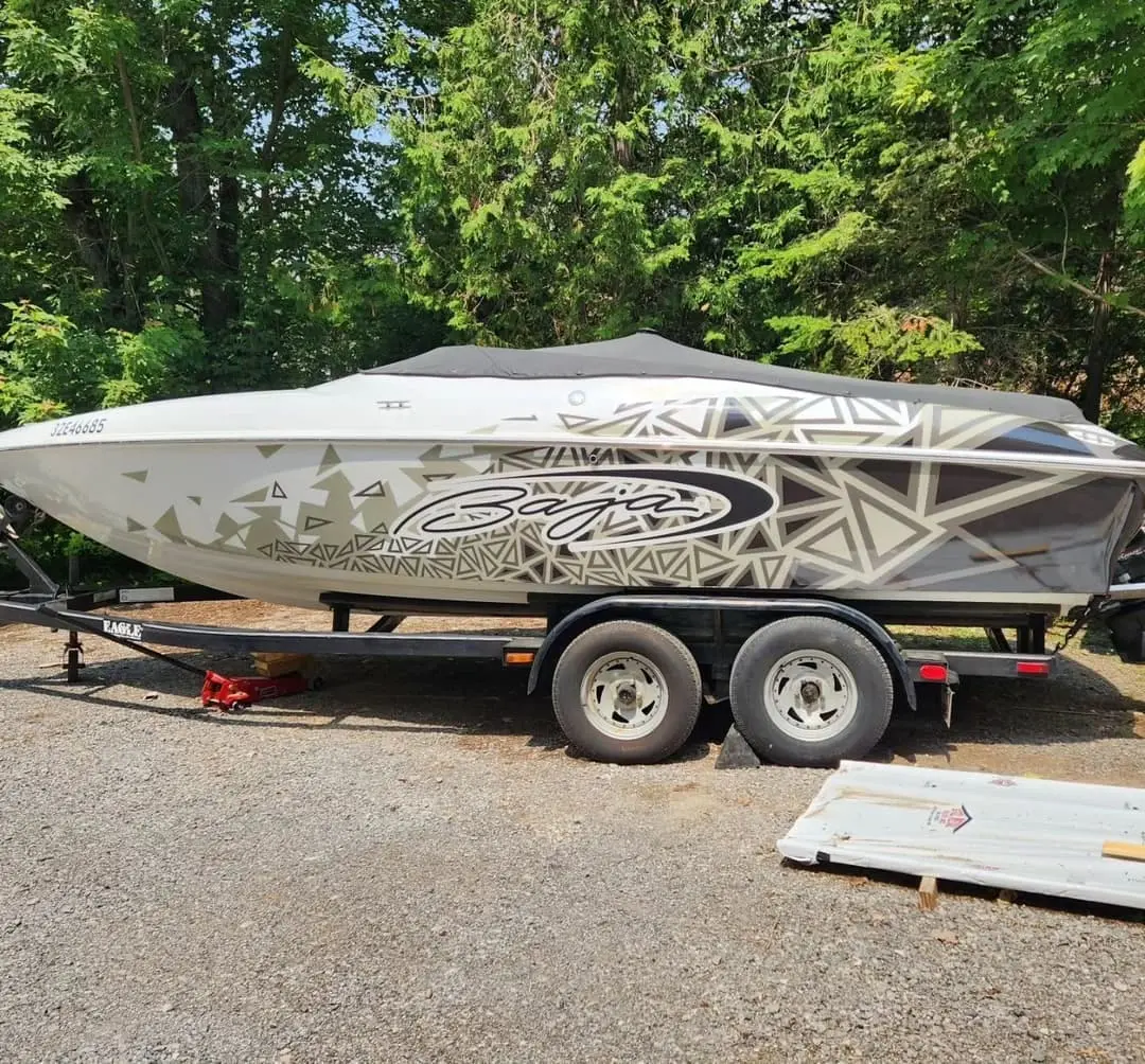 Boat with white camo wrap graphics