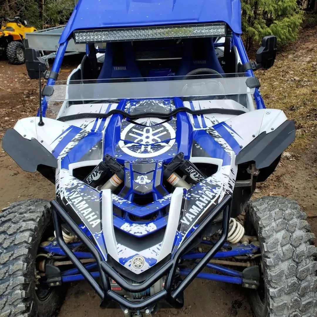 Yamaha YXZ side-by-side in a blue and white wrap