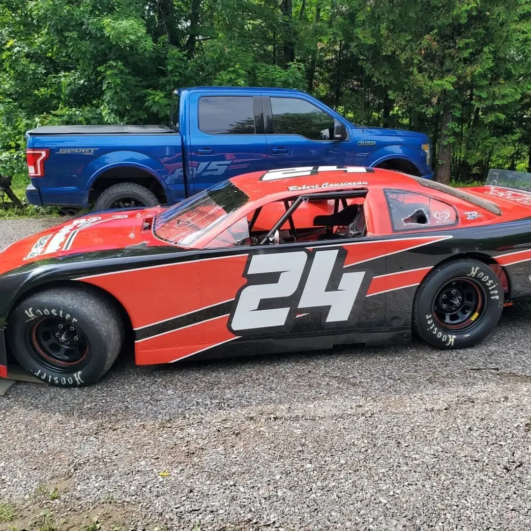 Race car #24 in orange and black
