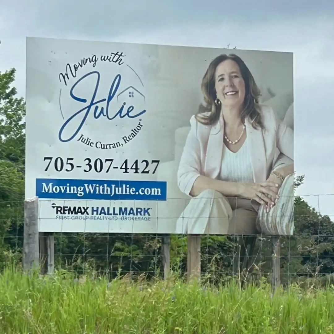 RE/MAX realtor road sign for Moving with Julie