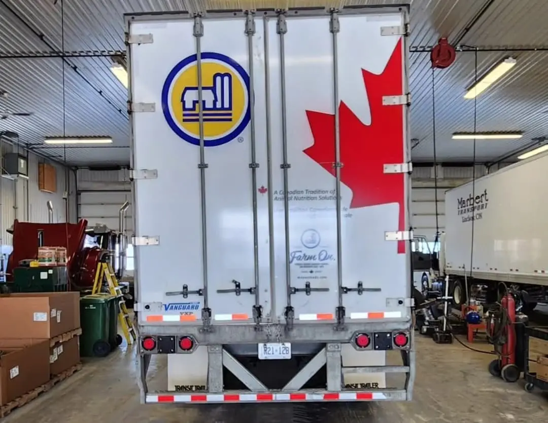 Masterfeeds trailer with a Canadian flag and logo