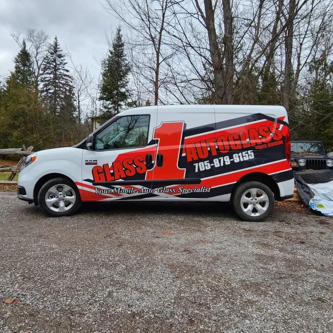 Glass One Auto Glass fleet car with red and black graphics
