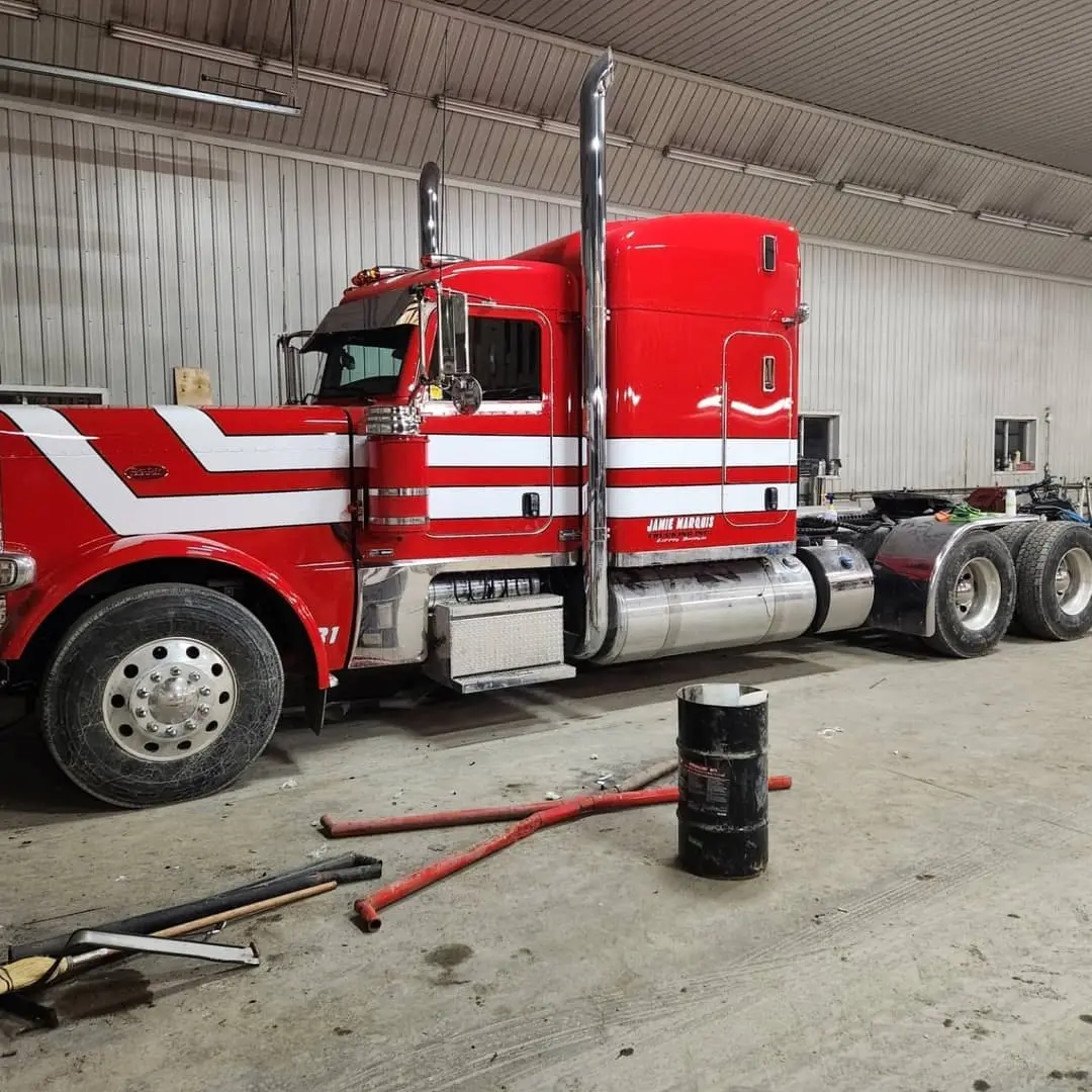 Red Peterbilt with white striping