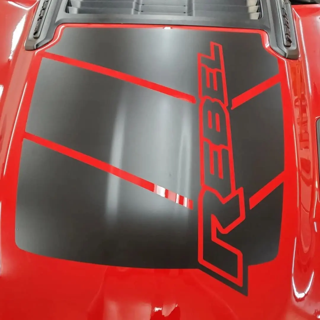 Red Ram TRX with black hood graphics