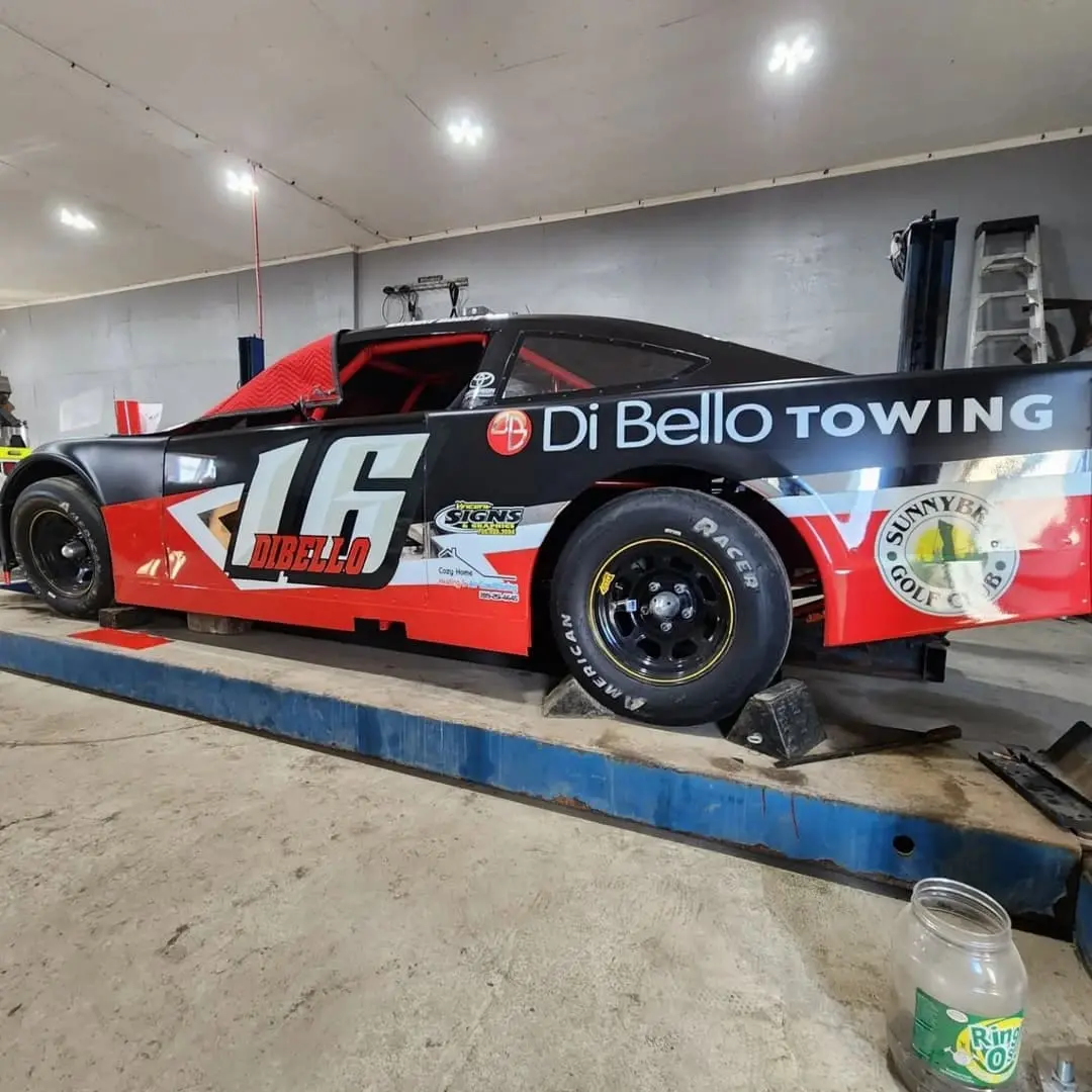 Race car #16 wrapped for Di Bello Towing