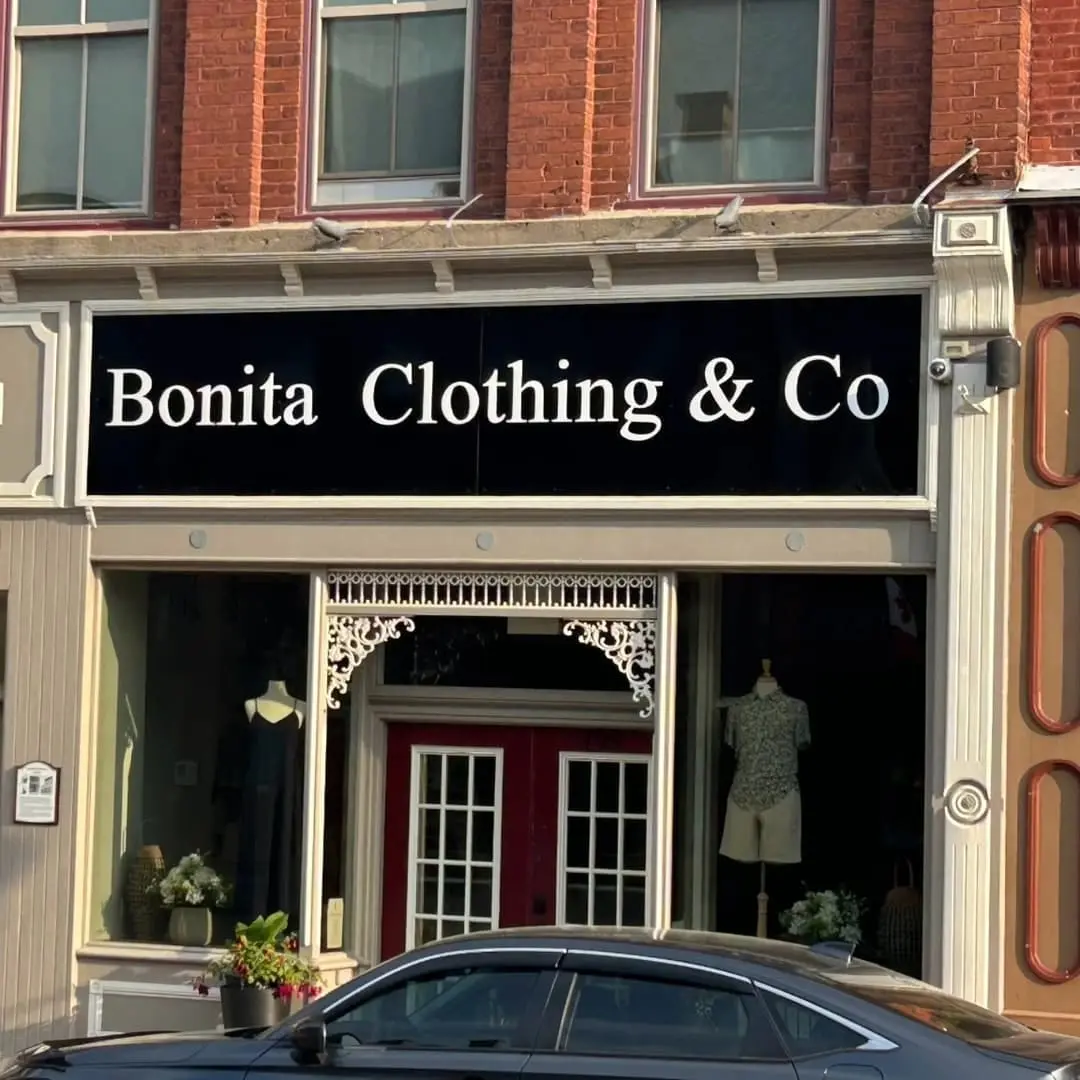 Gloss black storefront sign for Bonita Clothing & Co in Port Perry