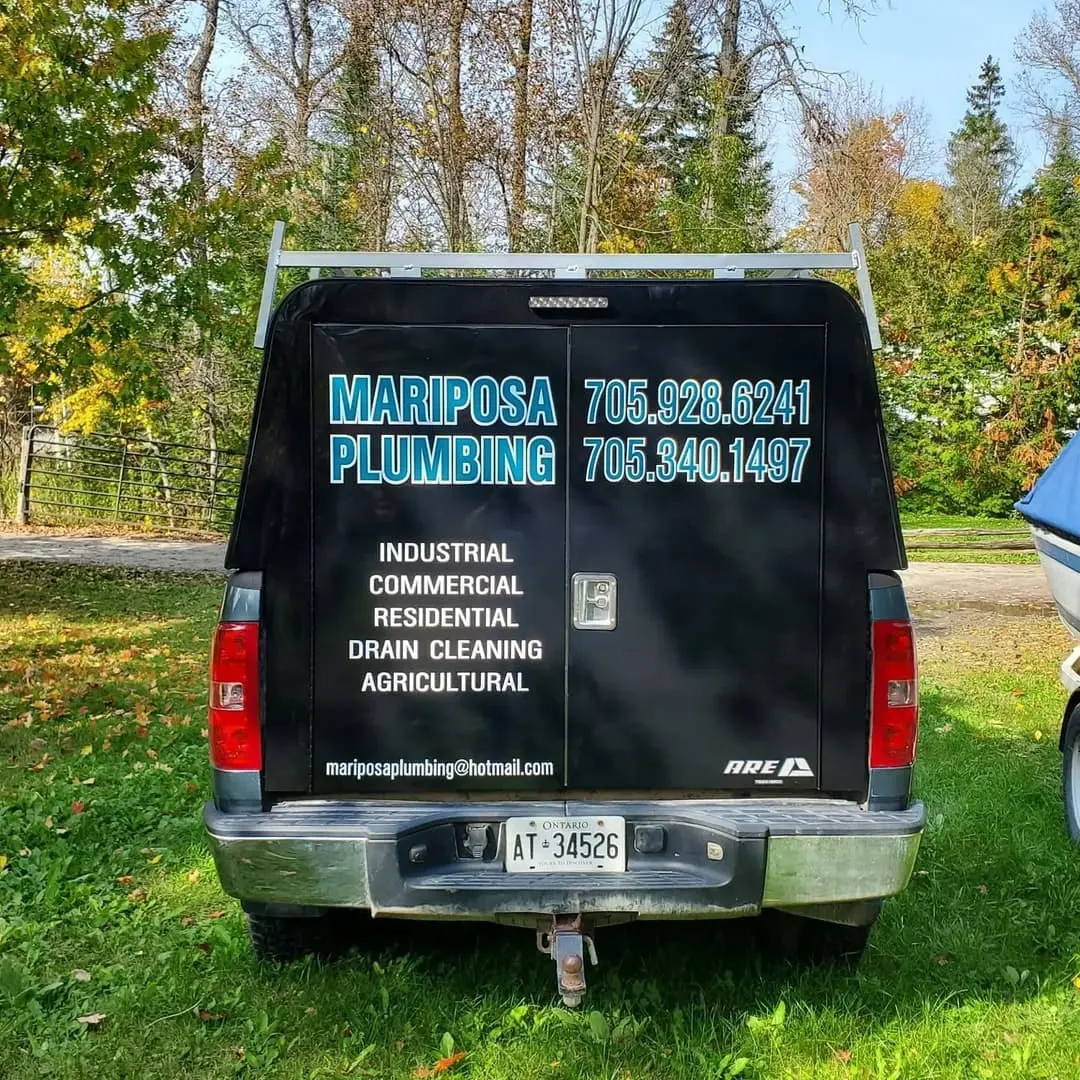 Pickup with rear window and door lettering