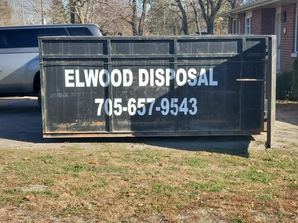 Elwood Disposal roll-off bins with lettering
