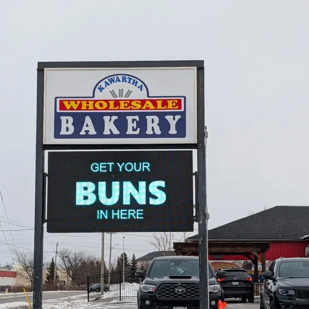 Kawartha Wholesale Bakery road sign with its new digital screen