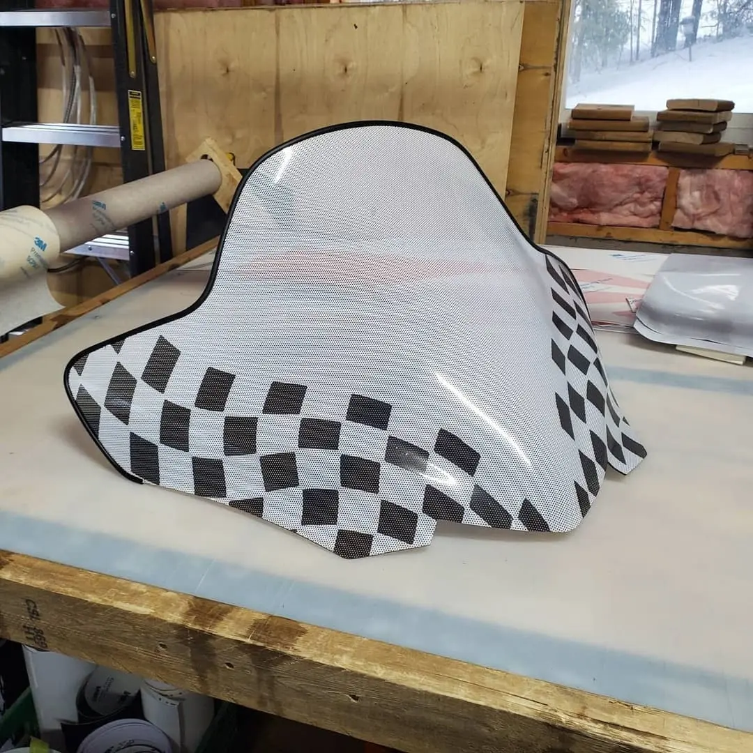 Checkered vinyl on fairing pieces in the shop