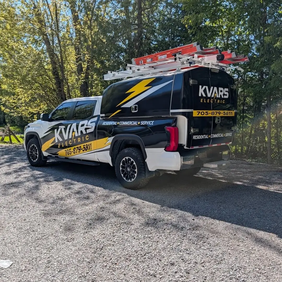 KVARS Electric pickup wrapped in black, yellow and white