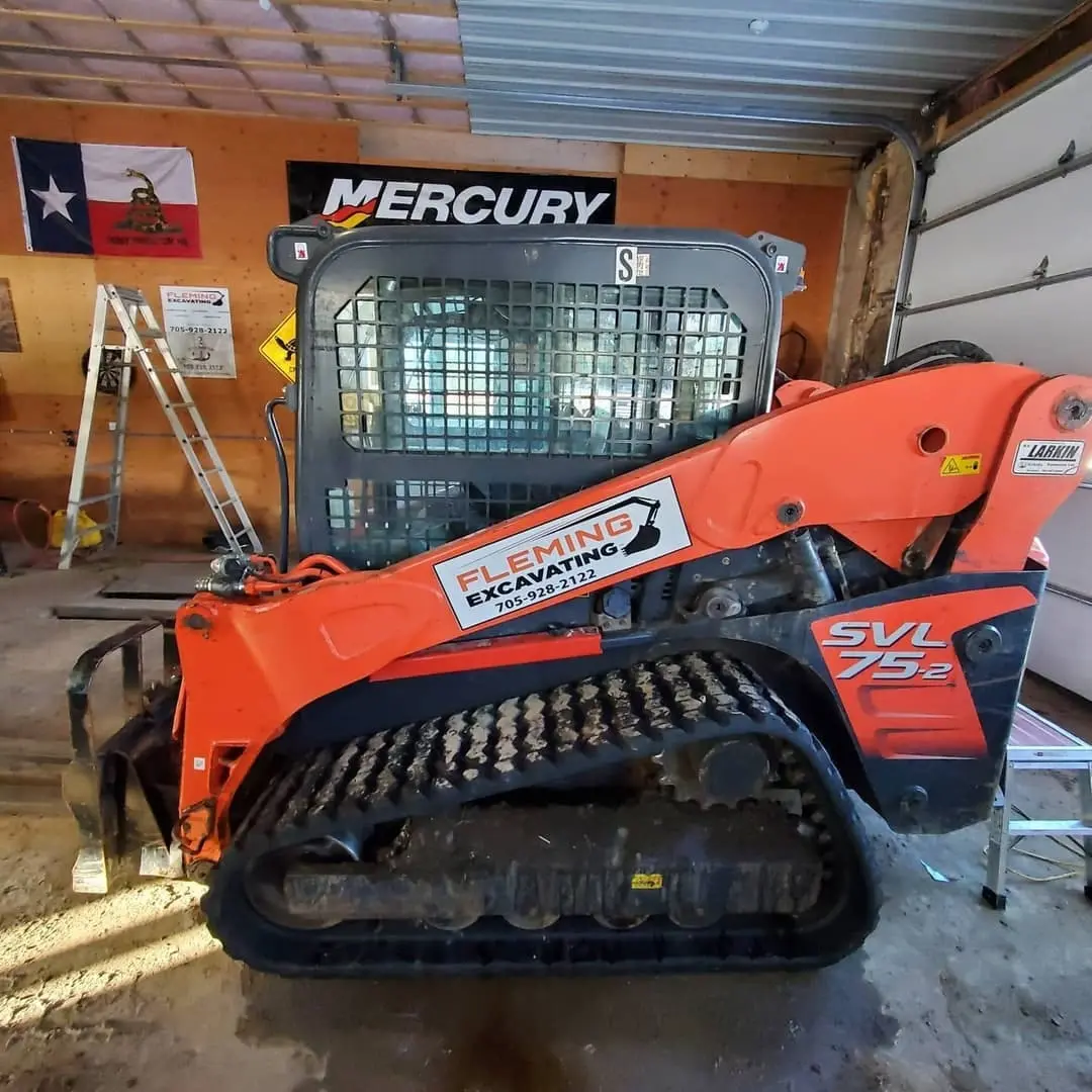 Fleming Excavating track loader and excavator lettering