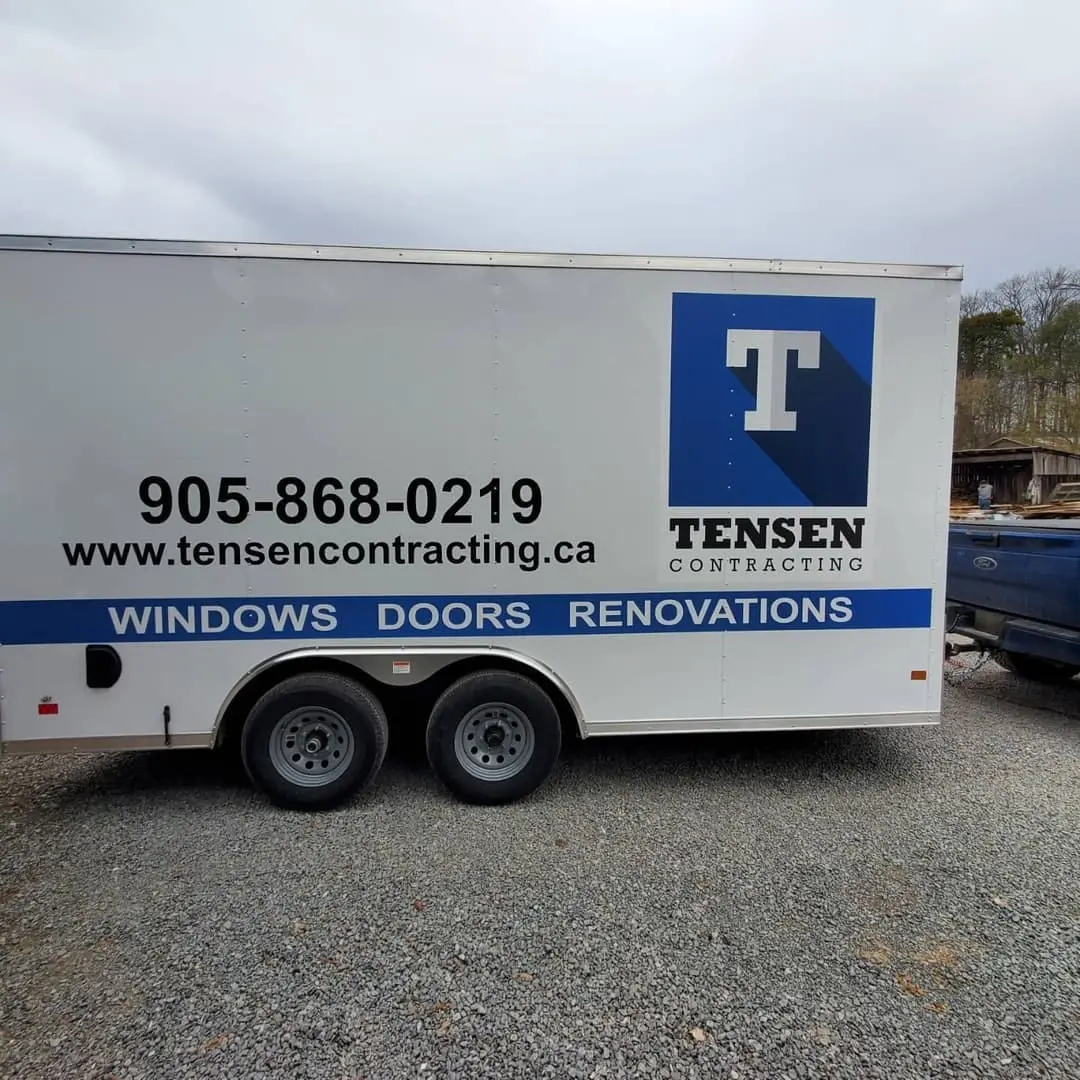 Enclosed trailer lettered for Tensen Contracting